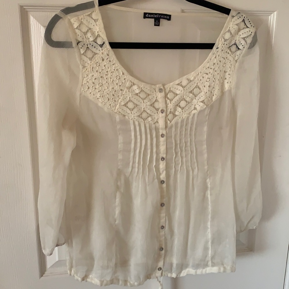 Beautiful sheer cream top.